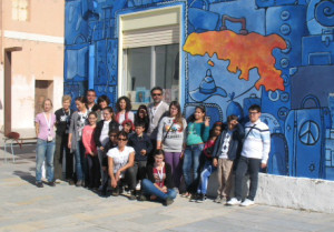 Local students gather outside the library in Lampedusa, Italy. Photo courtesy of Mariella Bertelli